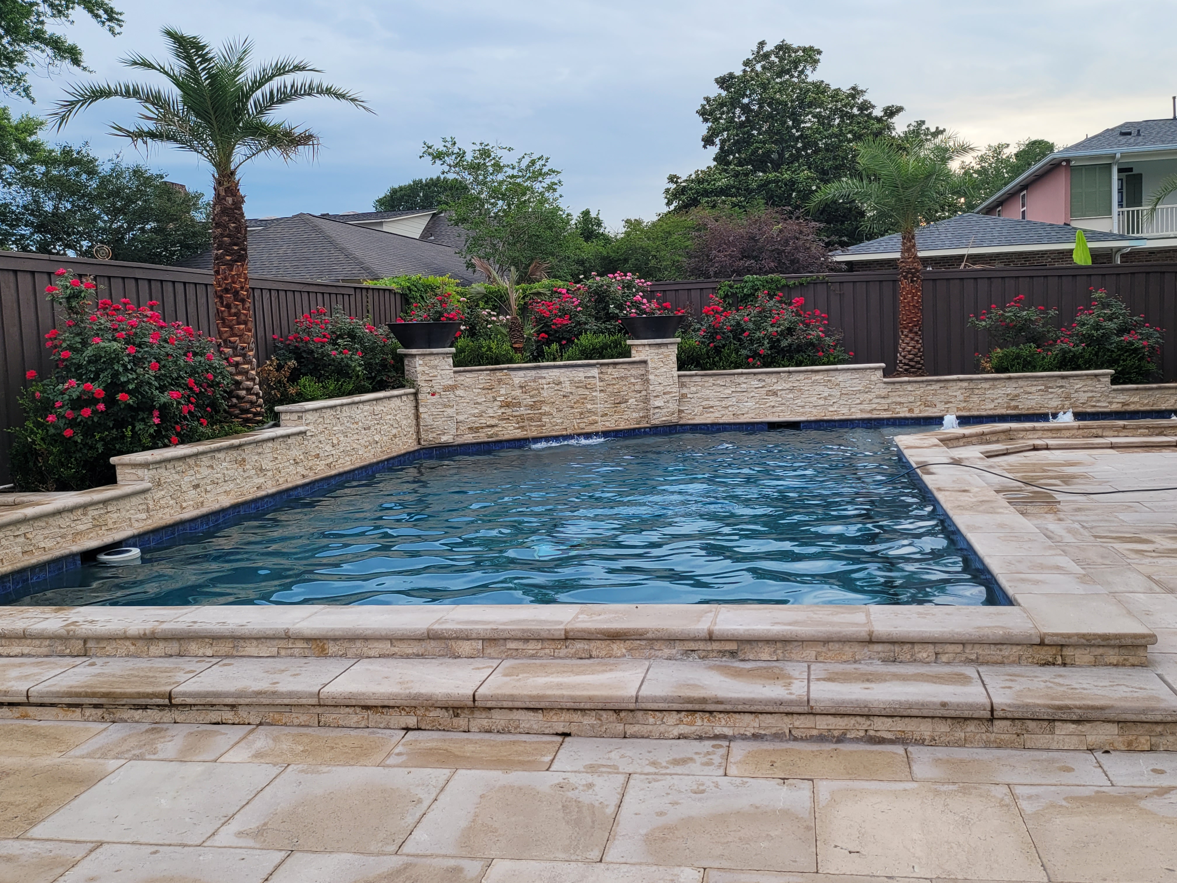 Travertine Pool Deck & Stacked Stone Wall